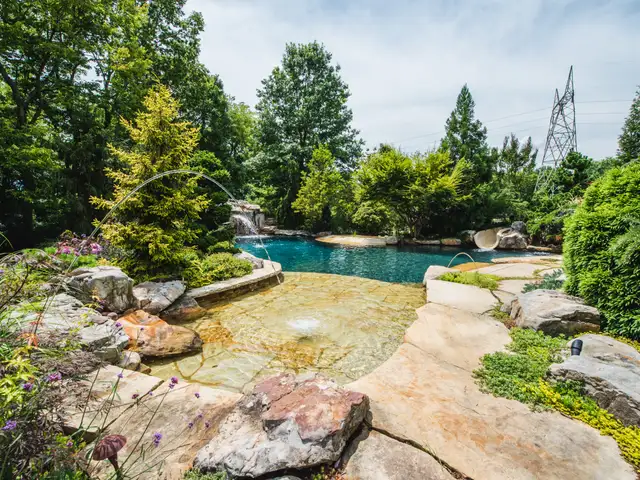 Free-form gunite pool built by Waterscapes Backyard Resorts in Middle Tennessee