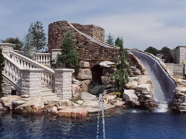 Pool waterslide built by Waterscapes Backyard Resorts in Middle Tennessee