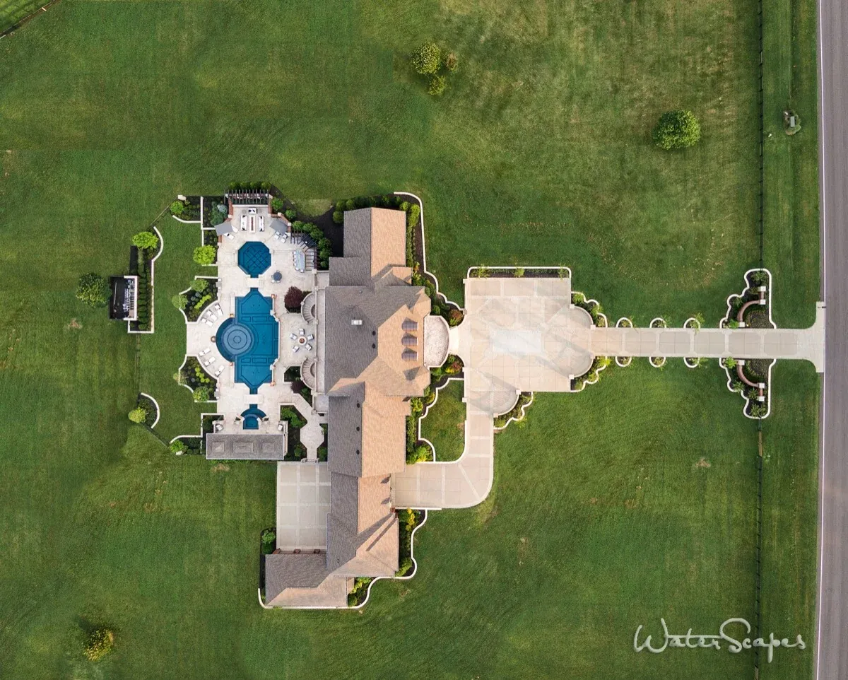 Aerial view of large luxury estate pool complex in Middle Tennessee